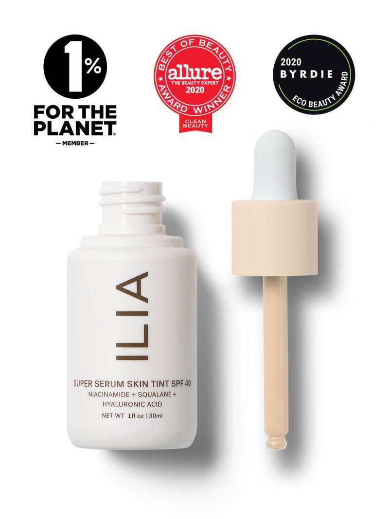 Super Serum Skin Tint bottle next to the dropper applicator. Seals for Allure Best of Beauty Award, Byrdie Eco Beauty Award, and the 1% for the Planet Member.